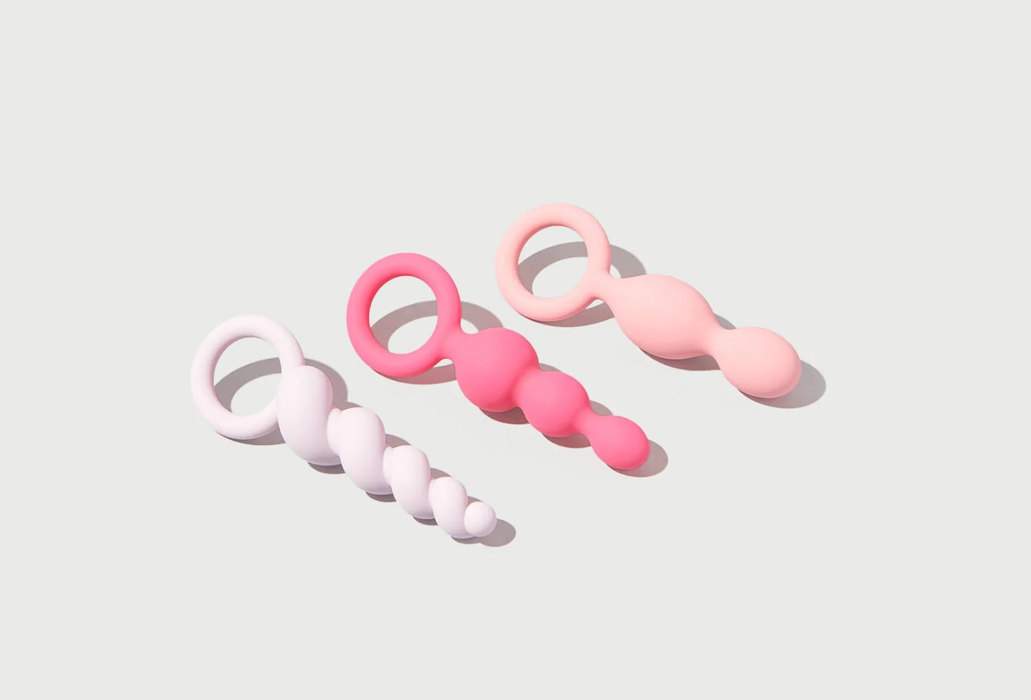 Conjunto de 3 plus anais Satisfyer Booty Call em silicone de cor rosa — vista de cima