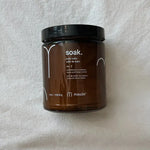 Sais de banho minerais Maude nº3, frasco 226 g em cima de um pano de linho cru