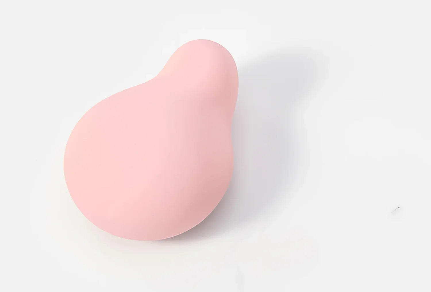 Vibrador clitoriano Iroha Midori em silicone de cor rosa claro — vista de cima