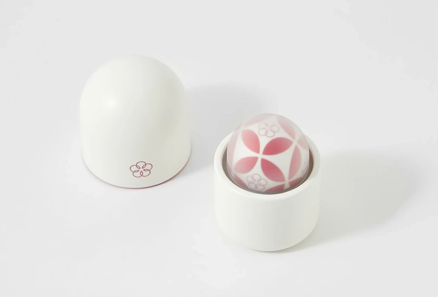 Vibrador clitoriano Iroha Temari em silicone de cor rosa escuro — vista de cima